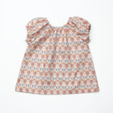 Peasant Blouse Sewing Pattern in Figo Fabrics Stork on a White Background