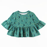 Bell Sleeve Peplum Top in Stars and Moons Fabric on White Background