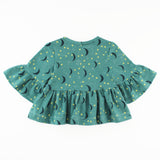 back of Bell Sleeve Peplum Top in Stars and Moons Fabric on White Background