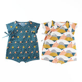 Two Wrap up Rompers Side by Side