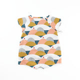 The Back of the Wrap Up Romper With a Raglan Sleeve