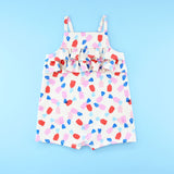 Poppy Romper Playsuit with ruffles in a strawberry candy print fabric