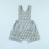 Rainy Day Romper in raindrop print on blue background