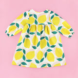 Back of Lemonade Dress PDF Sewing Pattern on a Pink Background