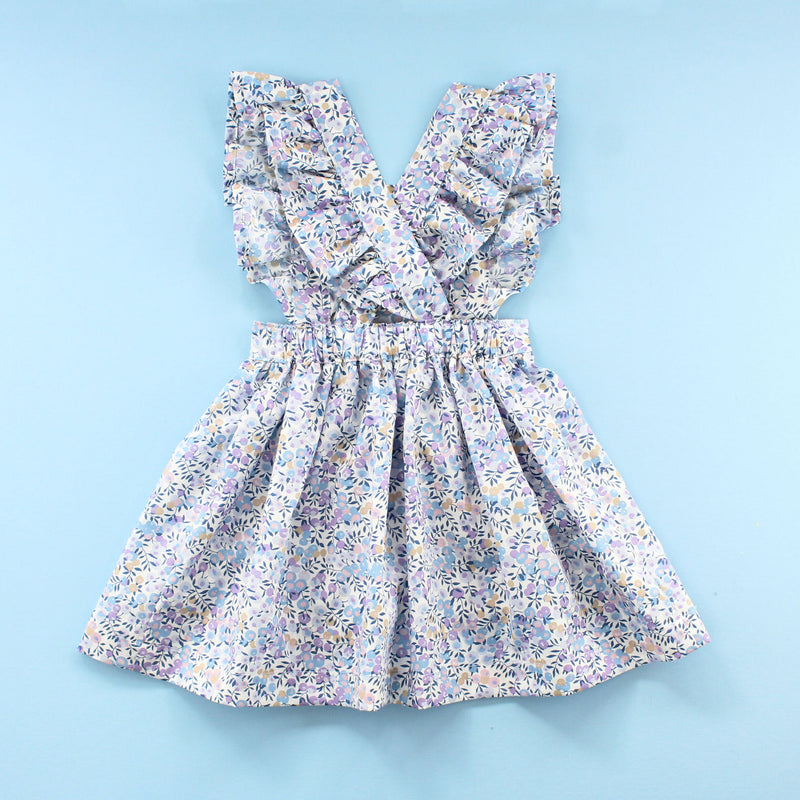 back of ruffle baby pinafore dress in blue liberty of london fabric