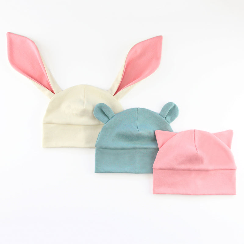 an array of baby hats with animal ears
