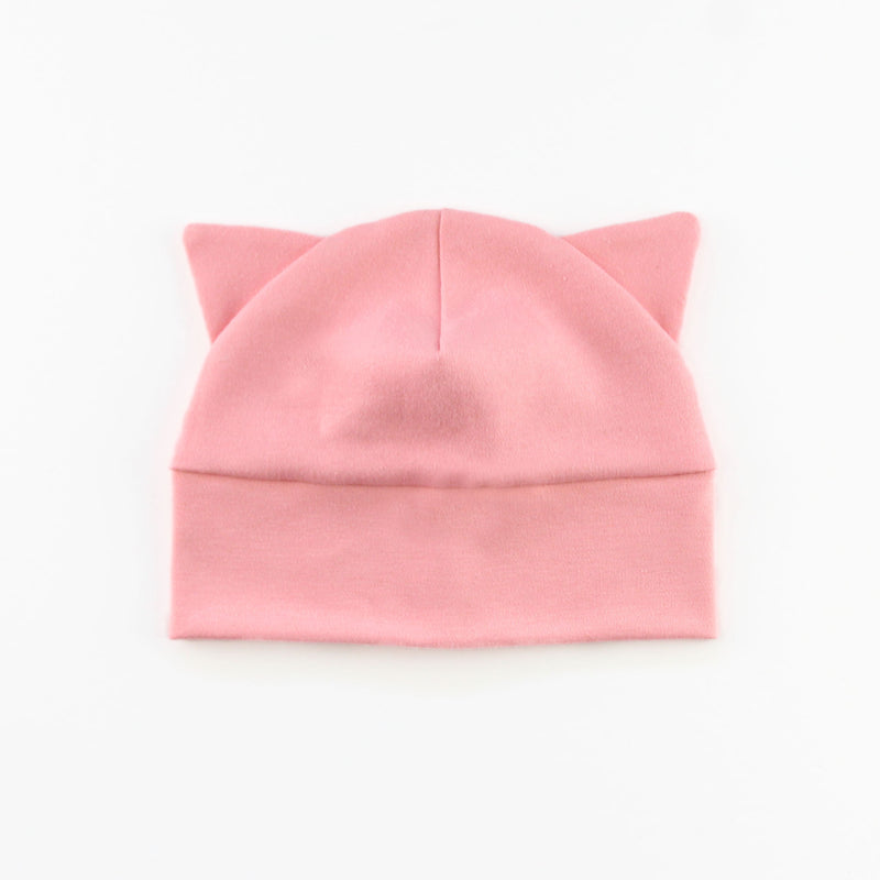 baby hat with cat ears in pink knit fabric