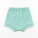 back of teal baby bummie shorts on a white background
