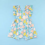 Flutter Sleeve Rainy Day Romper In fruit Fabric on Bright Blue Background